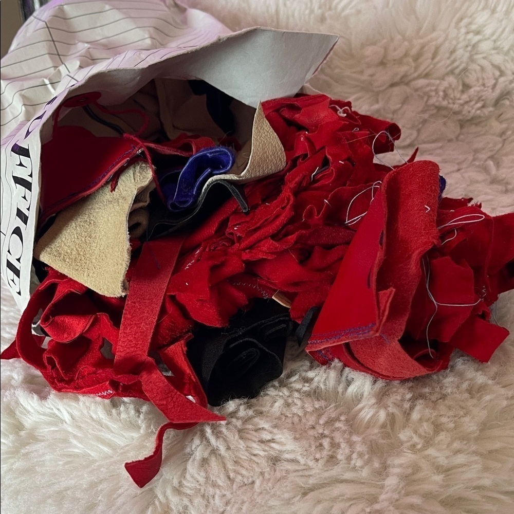 Assorted Fabric Scraps in Red and Black leather scraps